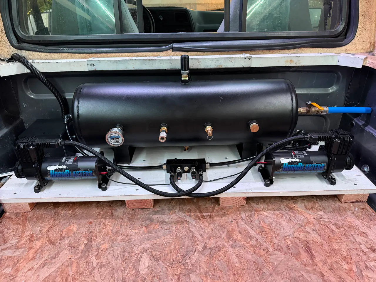 The 8-gallon tank and dual compressors, which now supply both of my horn systems
