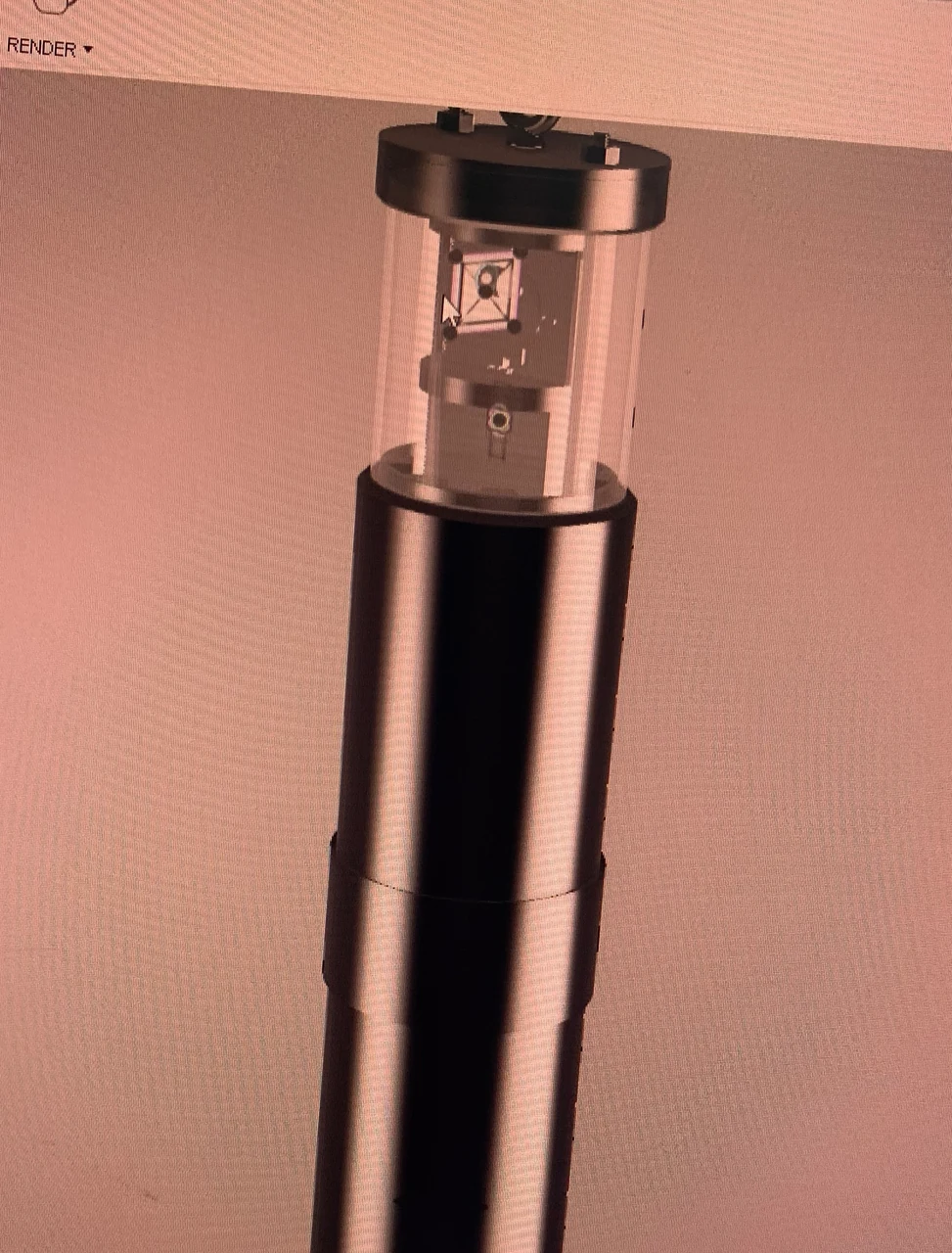 The payload bay in CAD, with the camera in the clear upper section