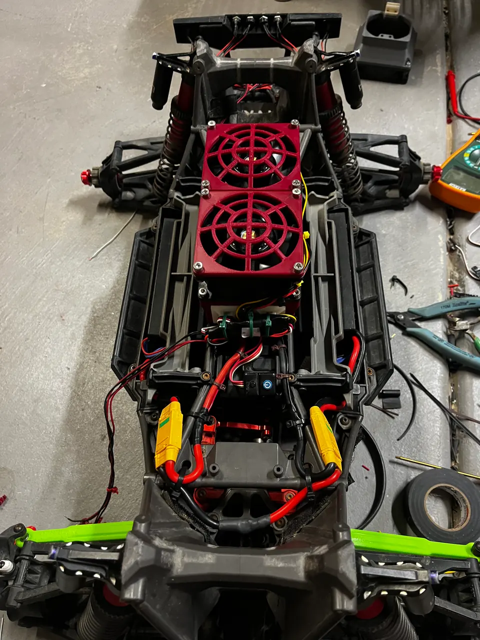 Twin cooling fans over the electronics