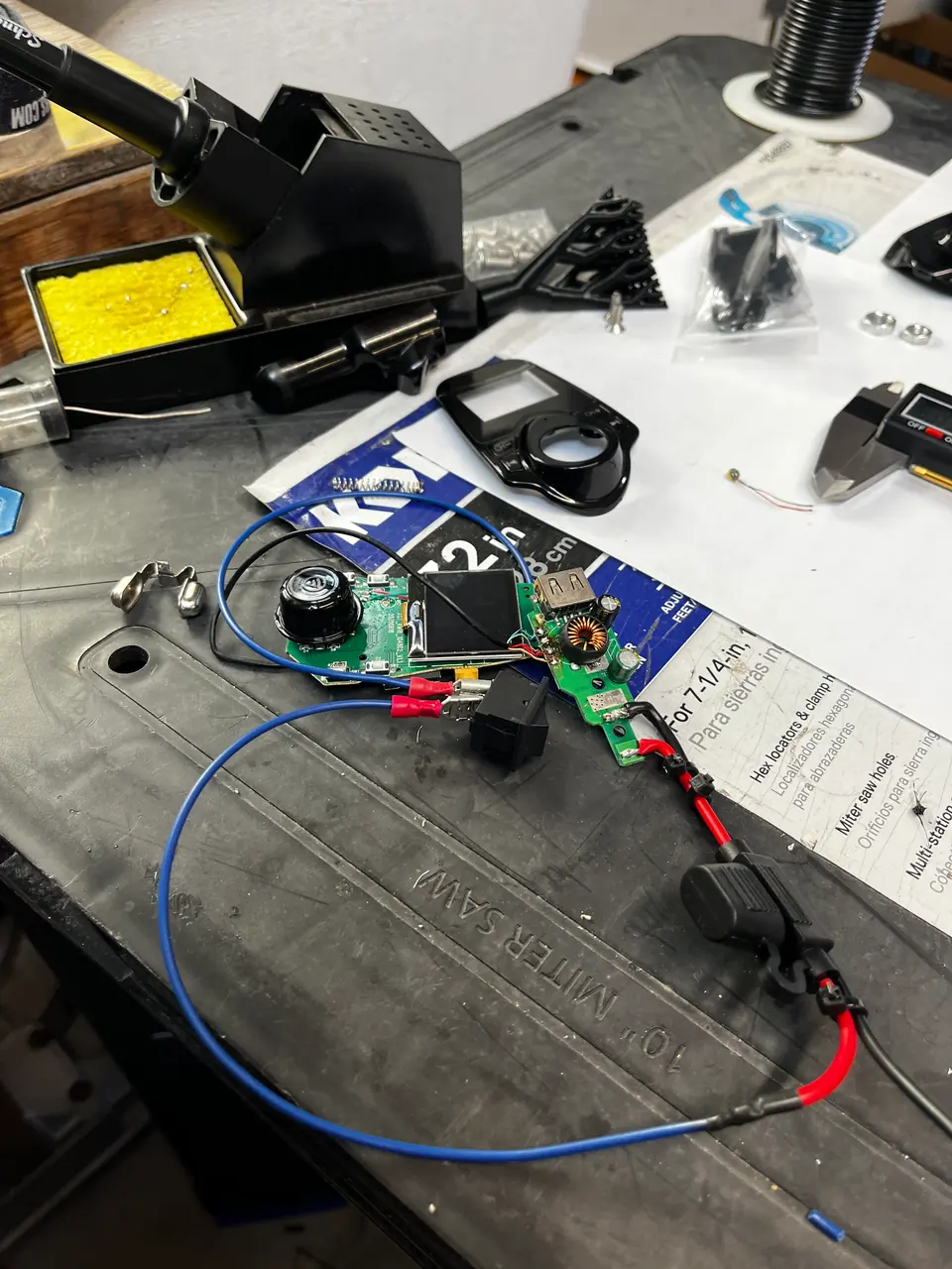 Working on the electronics at the soldering bench